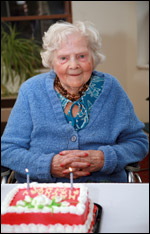 Woman with birthday cake photo